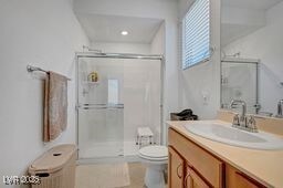 2379 Albury Ave, North Las Vegas, NV 89086 - bathroom with a shower stall and vanity