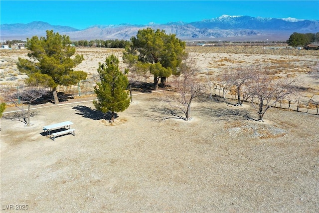 mountain view featuring a rural view