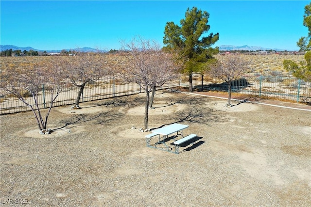 birds eye view of property featuring a mountain view