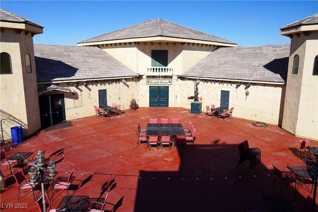 rear view of property with a patio