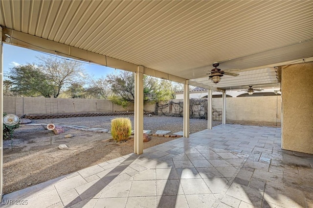 view of patio / terrace featuring ceiling fan