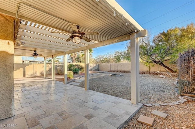 view of patio featuring ceiling fan