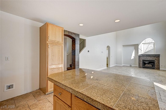 kitchen featuring a fireplace