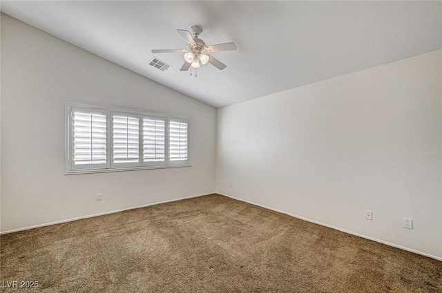 unfurnished room with vaulted ceiling, carpet floors, and ceiling fan