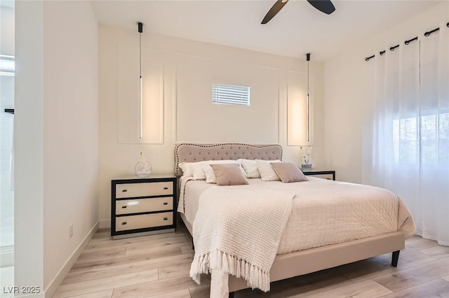 bedroom featuring ceiling fan and light hardwood / wood-style floors