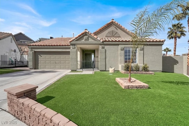 mediterranean / spanish-style home with a garage and a front lawn