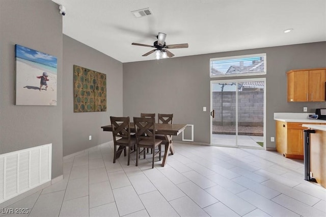 dining space featuring ceiling fan