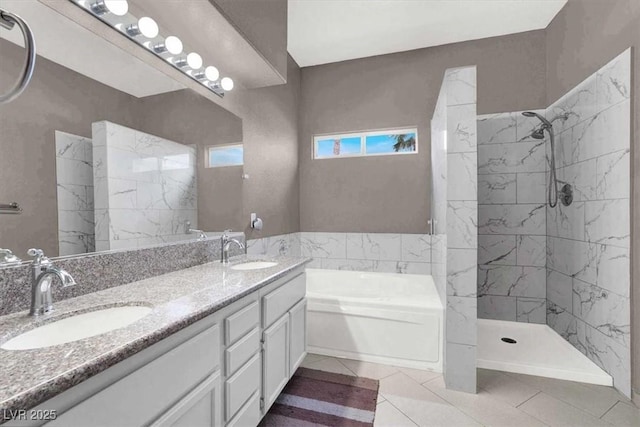 bathroom featuring tile patterned floors, vanity, and plus walk in shower