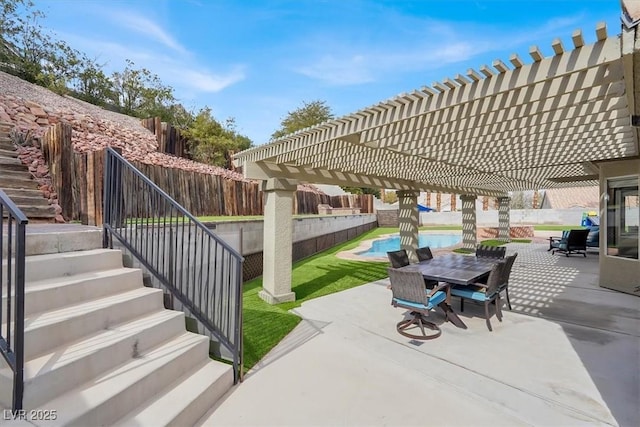 view of patio / terrace featuring a fenced in pool and a pergola