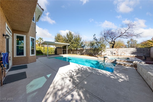 view of pool with a patio area