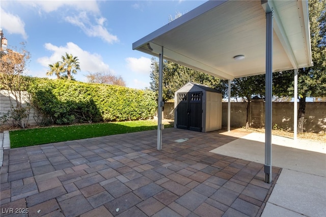 view of patio with a shed