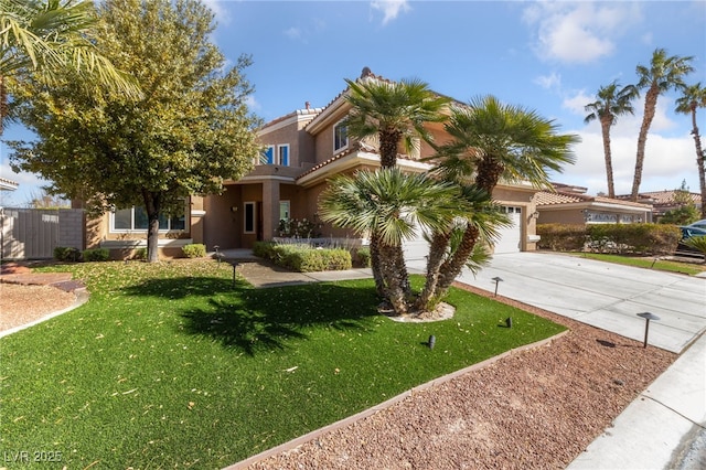 view of front of property with a garage and a front yard