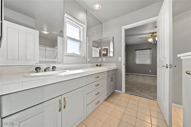 bathroom with vanity, tile patterned floors, and ceiling fan