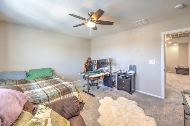 bedroom with ceiling fan and light colored carpet