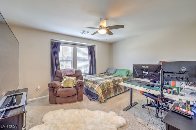 bedroom with light colored carpet and ceiling fan