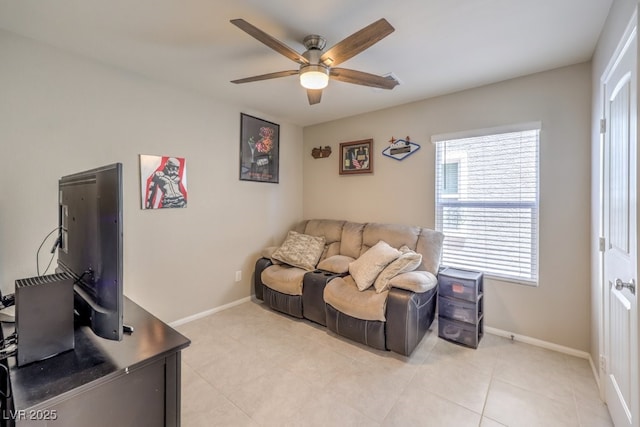 living room featuring light tile patterned flooring and ceiling fan