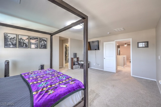 bedroom featuring light carpet