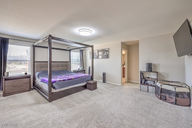 bedroom featuring light carpet