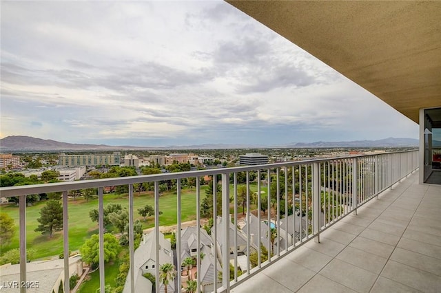 balcony featuring a mountain view