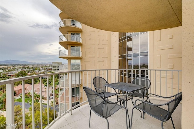 balcony featuring a mountain view