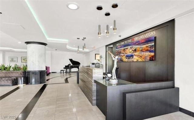 reception area featuring ornate columns