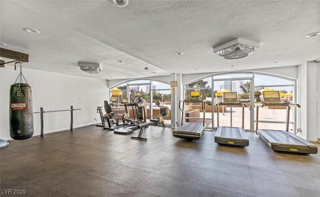 gym with a textured ceiling