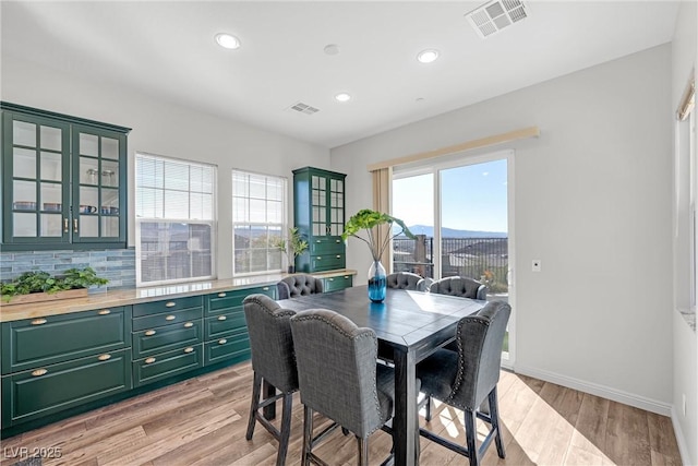 dining room with light hardwood / wood-style floors