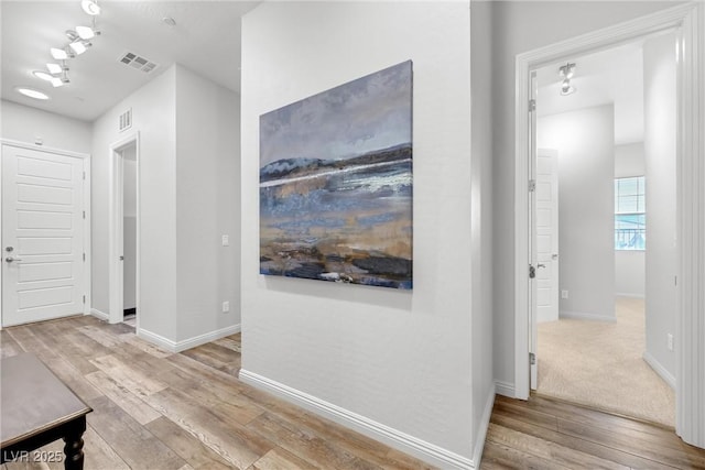 hall featuring light hardwood / wood-style flooring