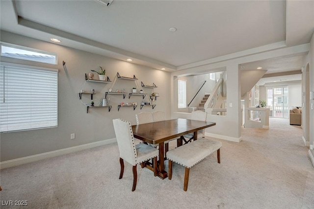 dining room with recessed lighting, stairway, baseboards, and carpet flooring