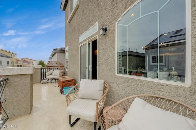 view of patio / terrace featuring a balcony