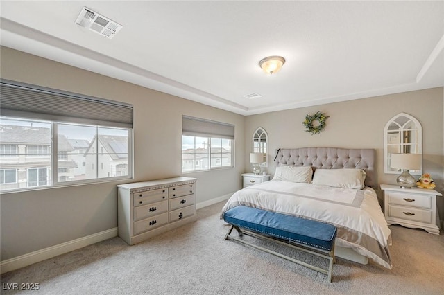 bedroom featuring visible vents, baseboards, and carpet flooring