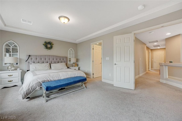 bedroom with visible vents, carpet flooring, and baseboards