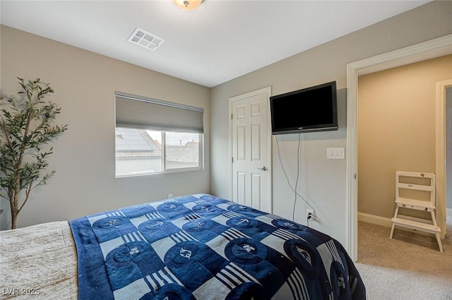 bedroom featuring carpet, visible vents, and baseboards