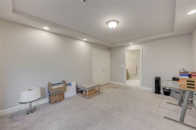 misc room featuring a tray ceiling, recessed lighting, carpet, and baseboards