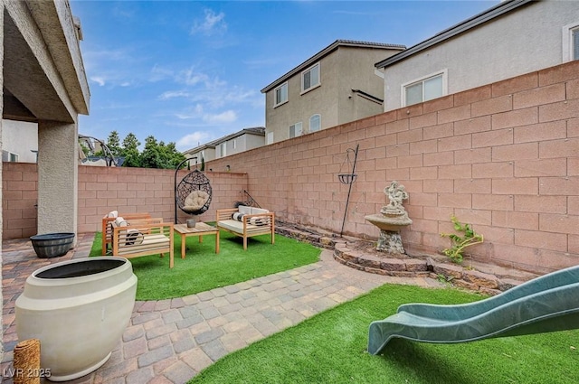 view of patio with a fenced backyard and an outdoor hangout area