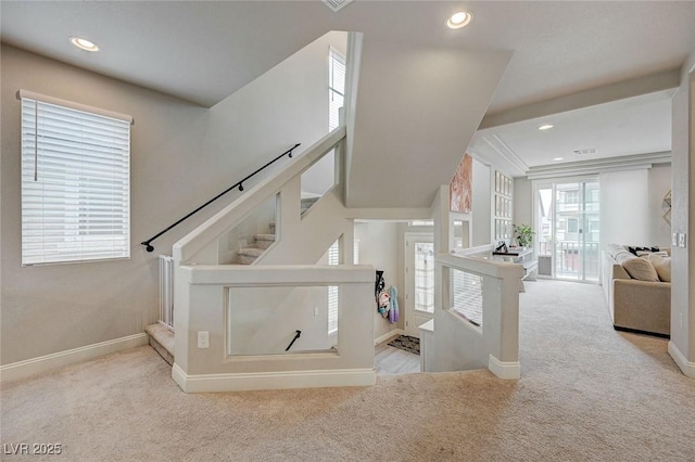 staircase featuring carpet flooring, recessed lighting, and baseboards