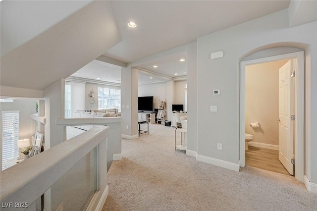 hall with recessed lighting, baseboards, and light carpet