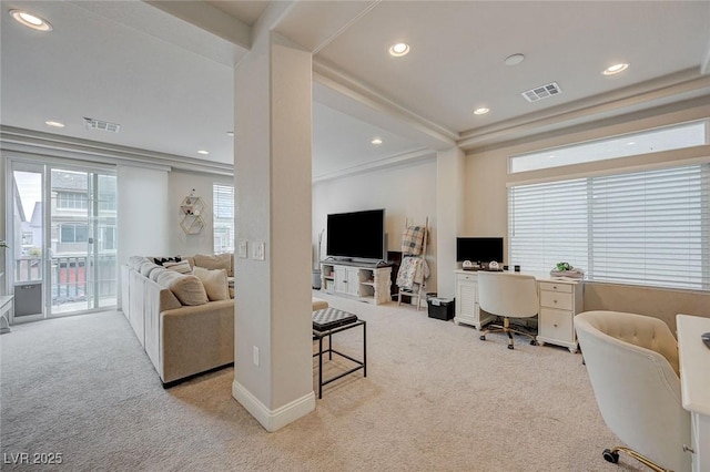 carpeted living room with visible vents, recessed lighting, and baseboards