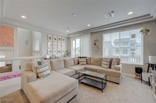 living room featuring carpet flooring, recessed lighting, visible vents, and baseboards