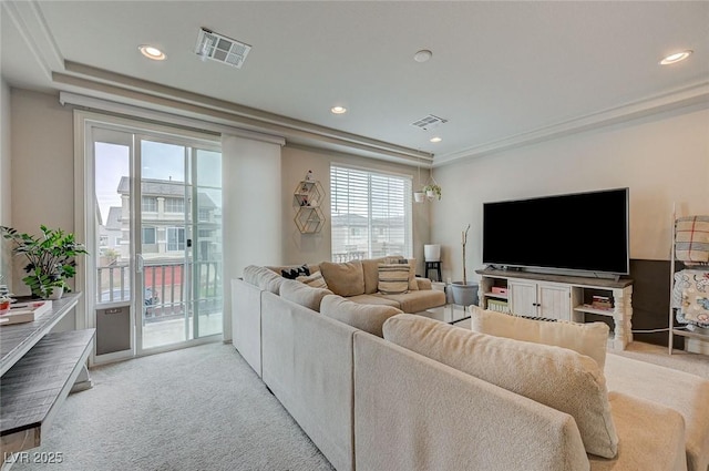 carpeted living room featuring recessed lighting and visible vents