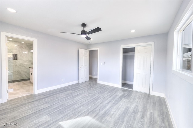 unfurnished bedroom with light wood-style floors, recessed lighting, a closet, and baseboards