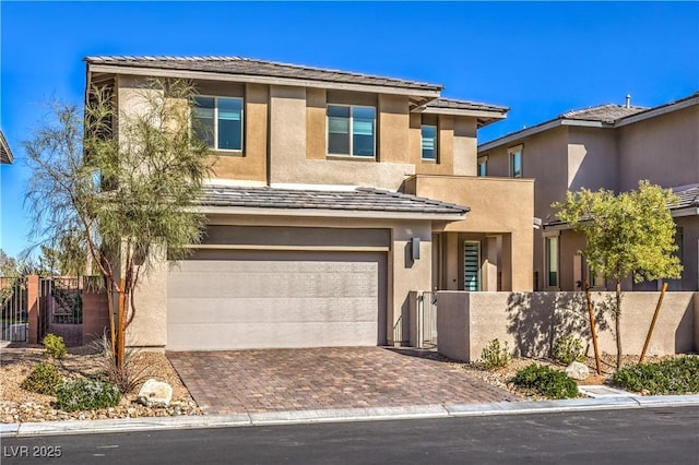 view of front of property featuring a garage