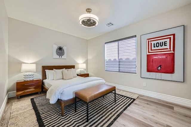 bedroom featuring light wood-type flooring