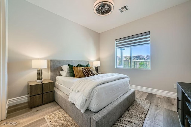 bedroom featuring light hardwood / wood-style flooring