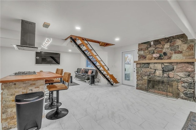 interior space with a stone fireplace