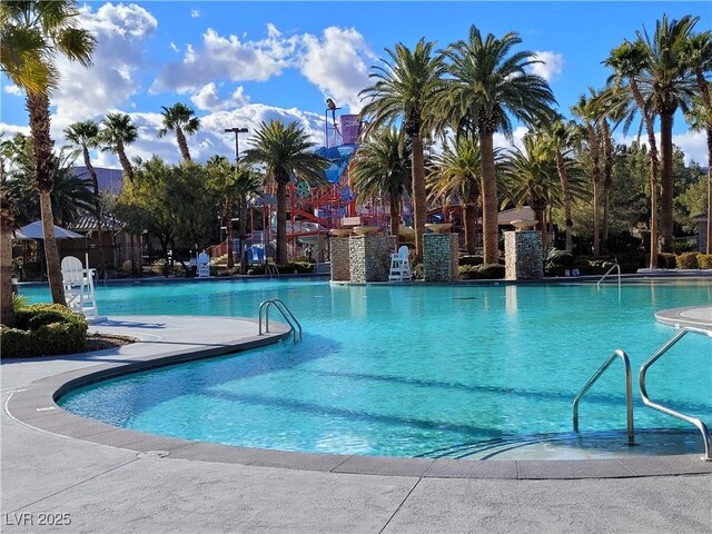 community pool featuring fence