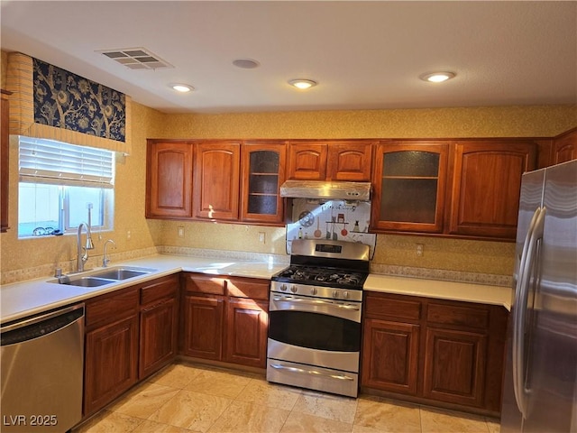 kitchen with appliances with stainless steel finishes and sink