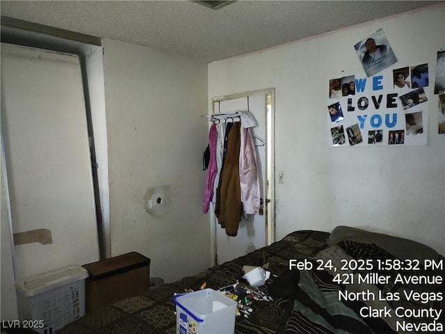 421 Miller Ave, North Las Vegas, NV 89030 - bedroom with a textured ceiling