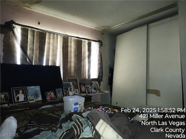 421 Miller Ave, North Las Vegas, NV 89030 - bedroom with a textured ceiling