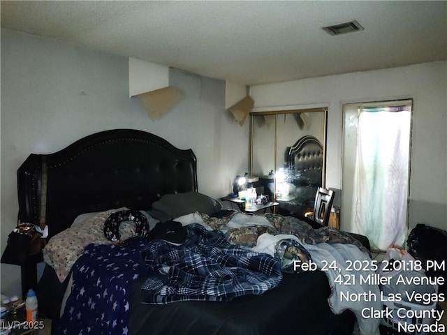 421 Miller Ave, North Las Vegas, NV 89030 - bedroom with visible vents and a closet